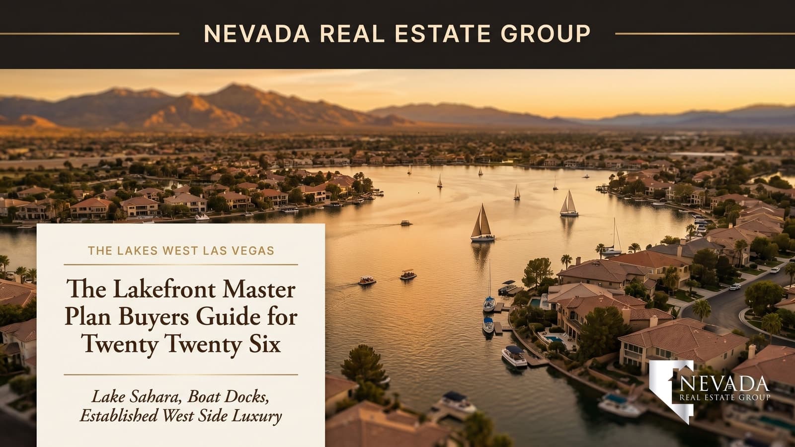 Aerial view of The Lakes master plan in west Las Vegas at golden hour showing 30-acre Lake Sahara at the center with residential villages clustering around the lakeshore and the Spring Mountains in the background