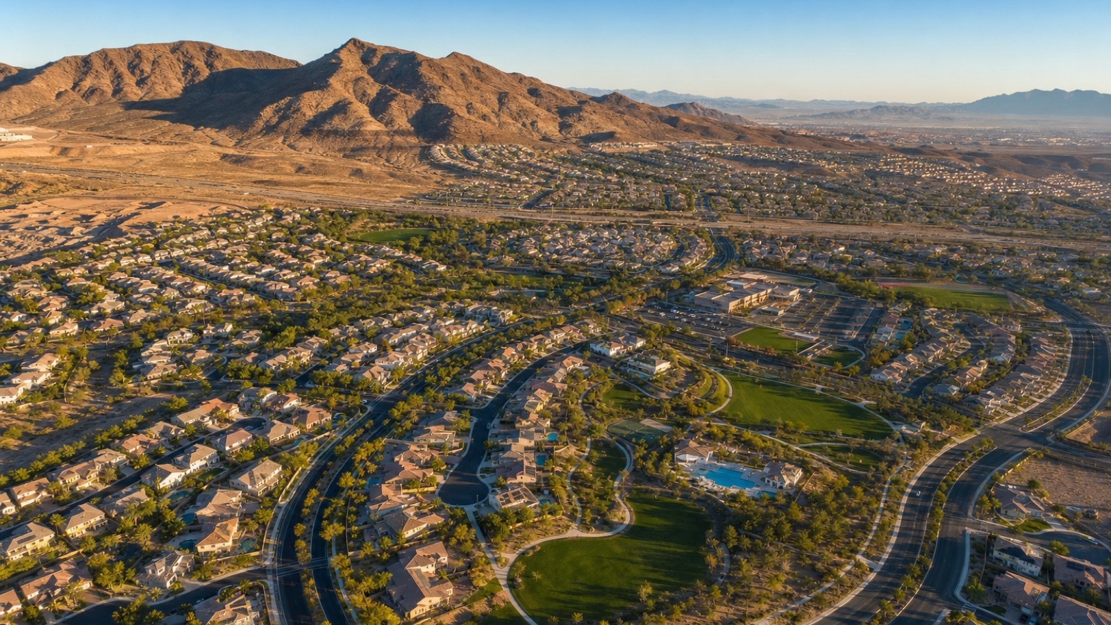 Anthem Country Club Henderson custom Mediterranean luxury estate exterior with paver driveway and Black Mountain backdrop