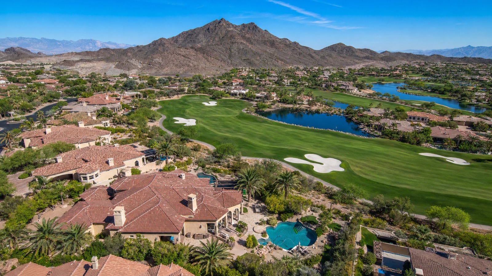 Anthem Country Club Henderson Hale Irwin signature golf course at golden hour with Black Mountain backdrop