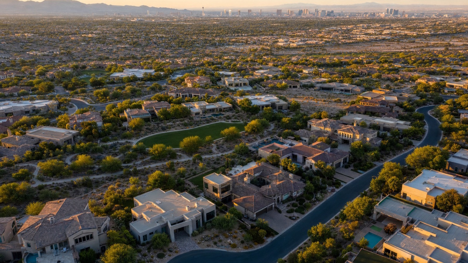 Summerlin family village with homes near a top-rated Las Vegas school zone against Red Rock Canyon