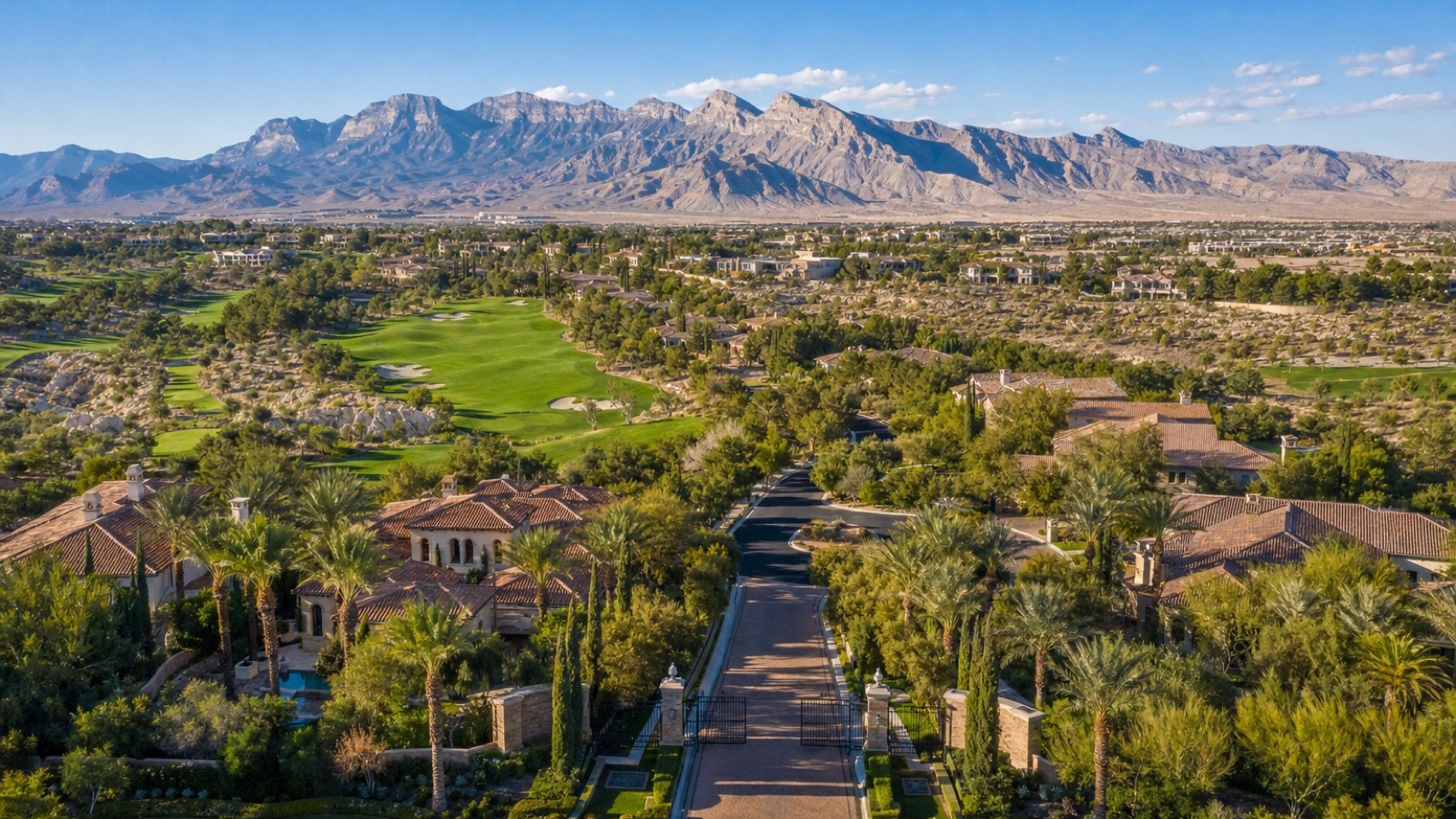 Las Vegas guard-gated country club clubhouse and pool deck with mature palm trees