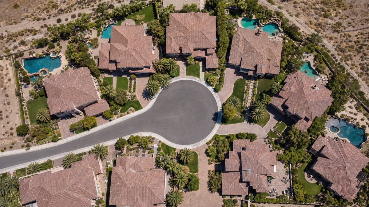 Aerial view of a Henderson suburban cul-de-sac neighborhood — representative of the high-volume single-family residential territory Las Vegas real estate agents work daily