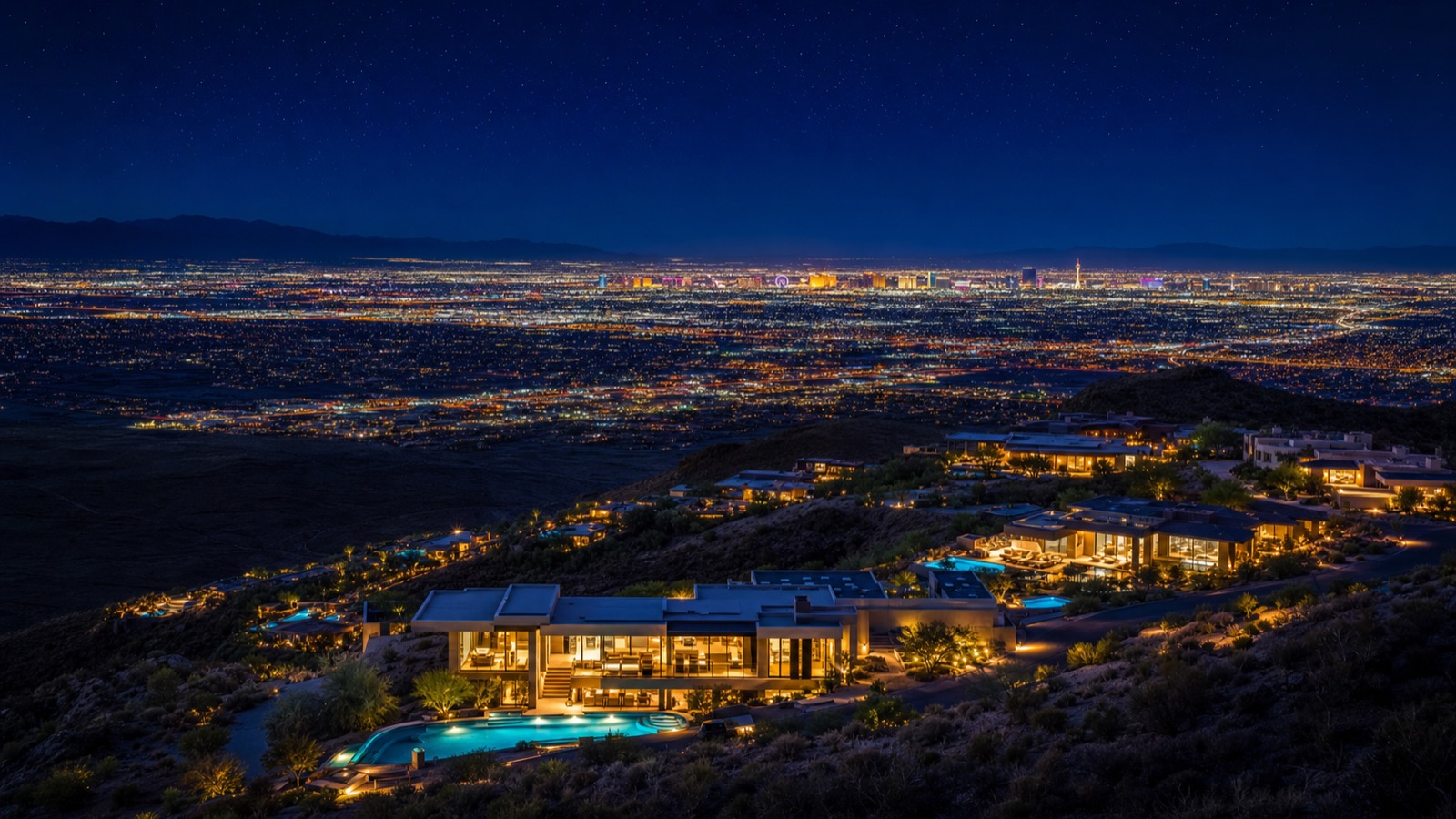 Hillside luxury estate at twilight with mountain backdrop in northwest Las Vegas