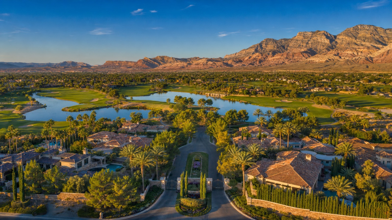 Summerlin master-planned luxury homes set against Red Rock Canyon on the western rim of the Las Vegas valley at golden hour