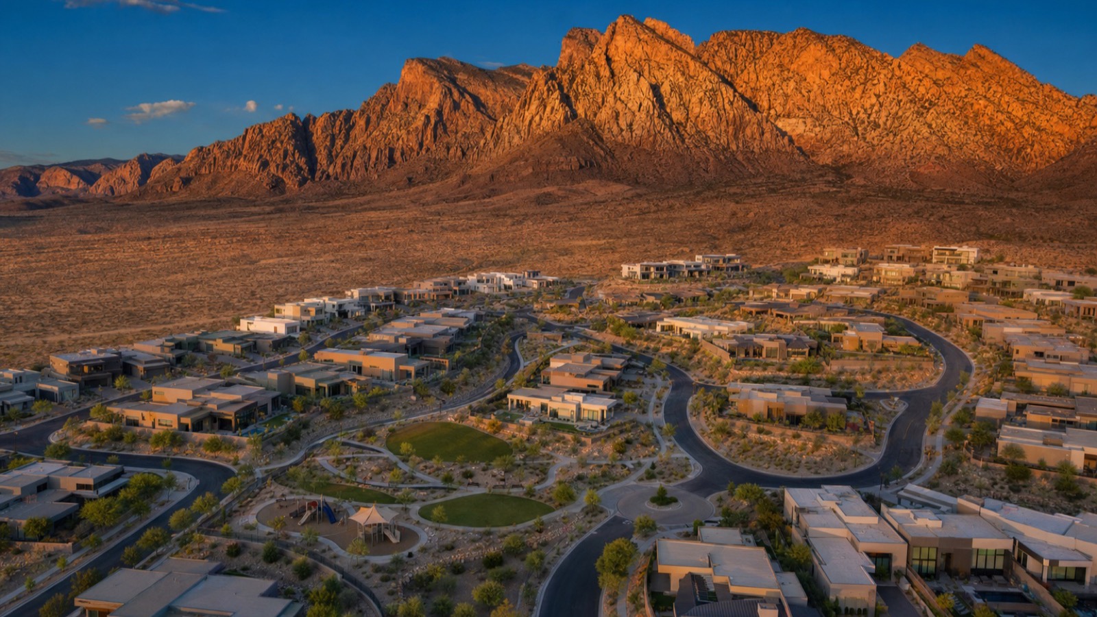 Las Vegas homes against the red cliffs and trails of Red Rock Canyon, appealing to outdoor-loving Oregon transplants