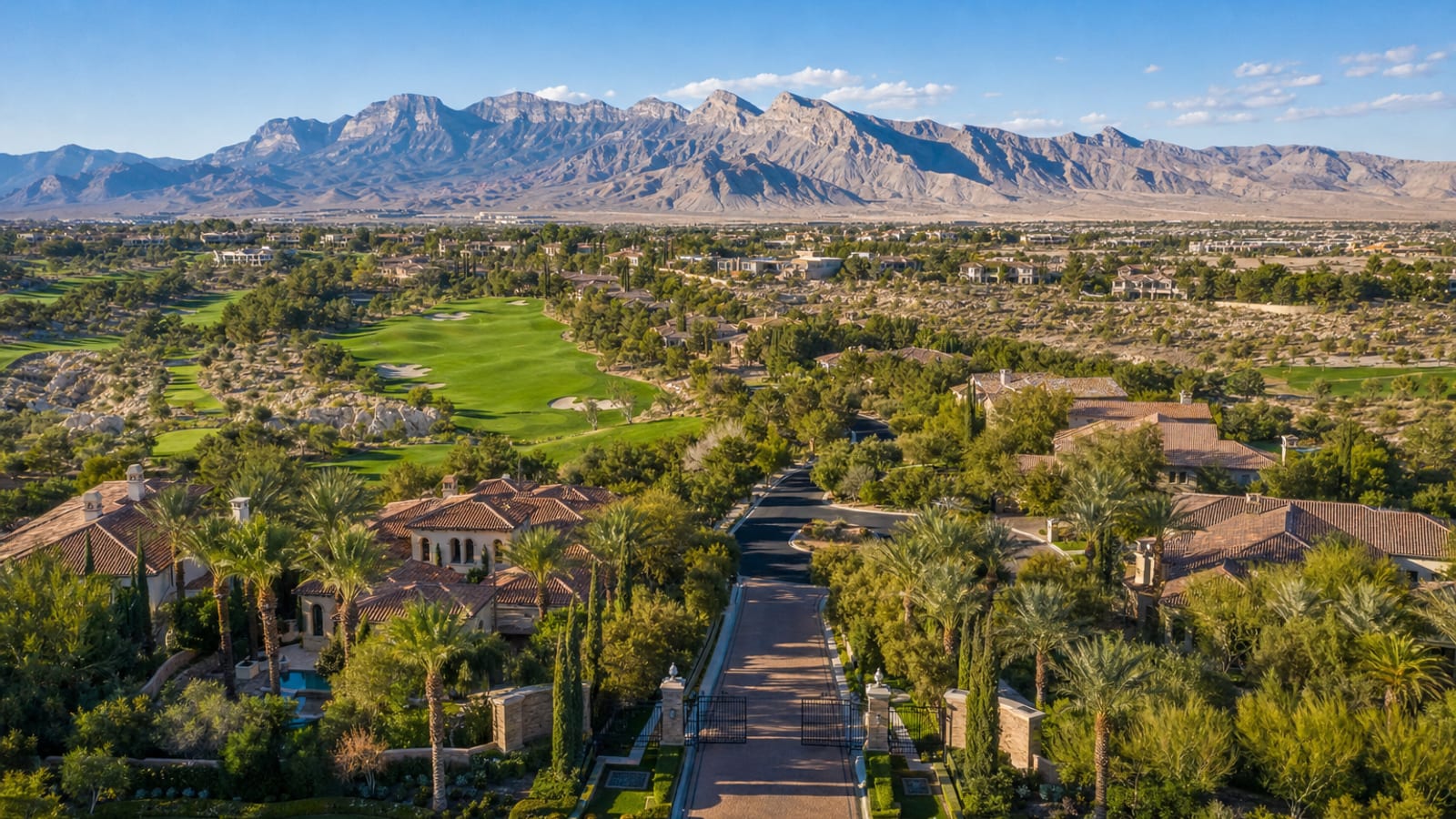 Queensridge guard-gated luxury estate community aerial in central-west Las Vegas with Mediterranean custom homes inside the Peccole Ranch master plan