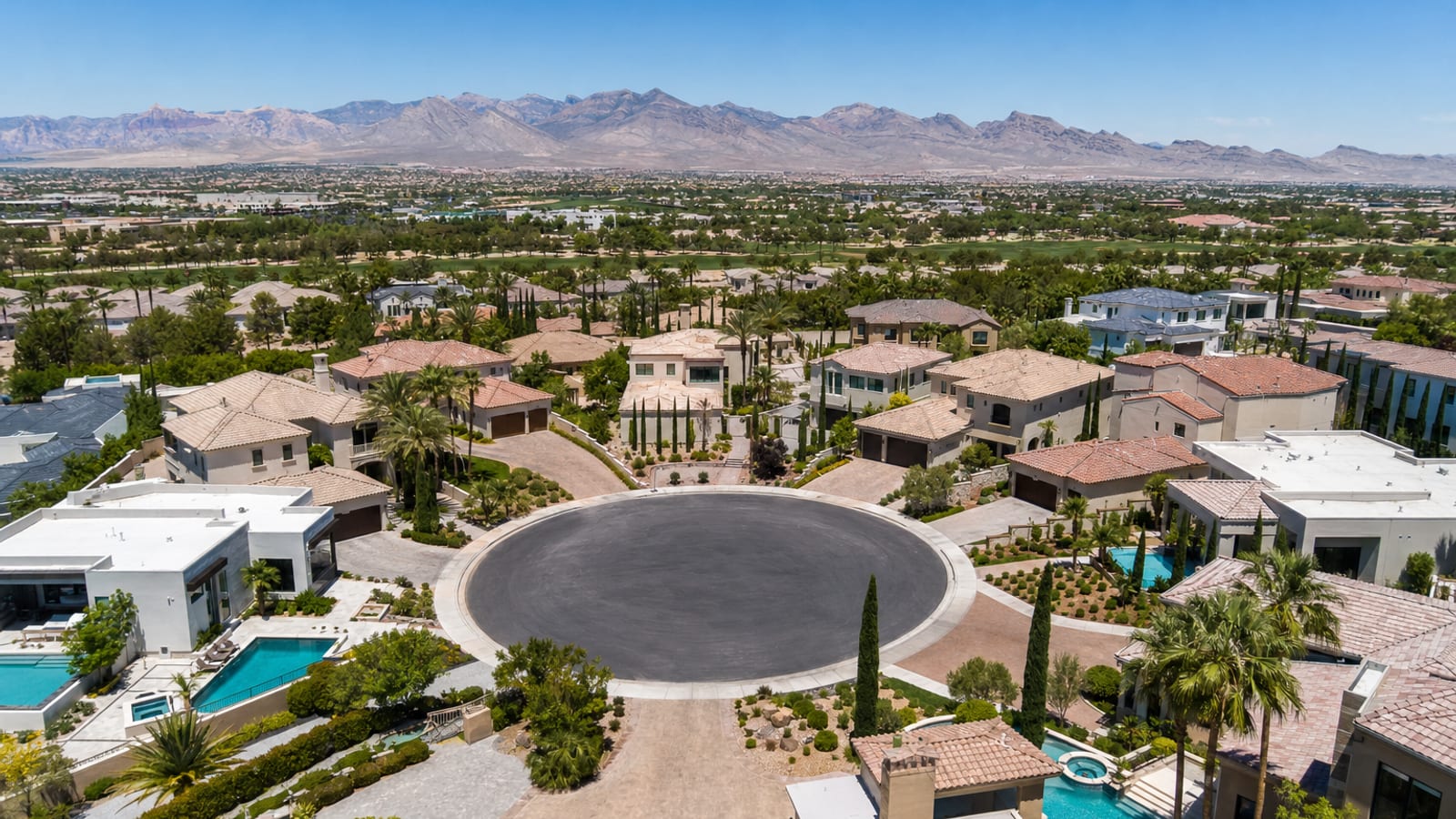 Queensridge luxury cul-de-sac with custom Mediterranean estate homes inside the guard-gated community
