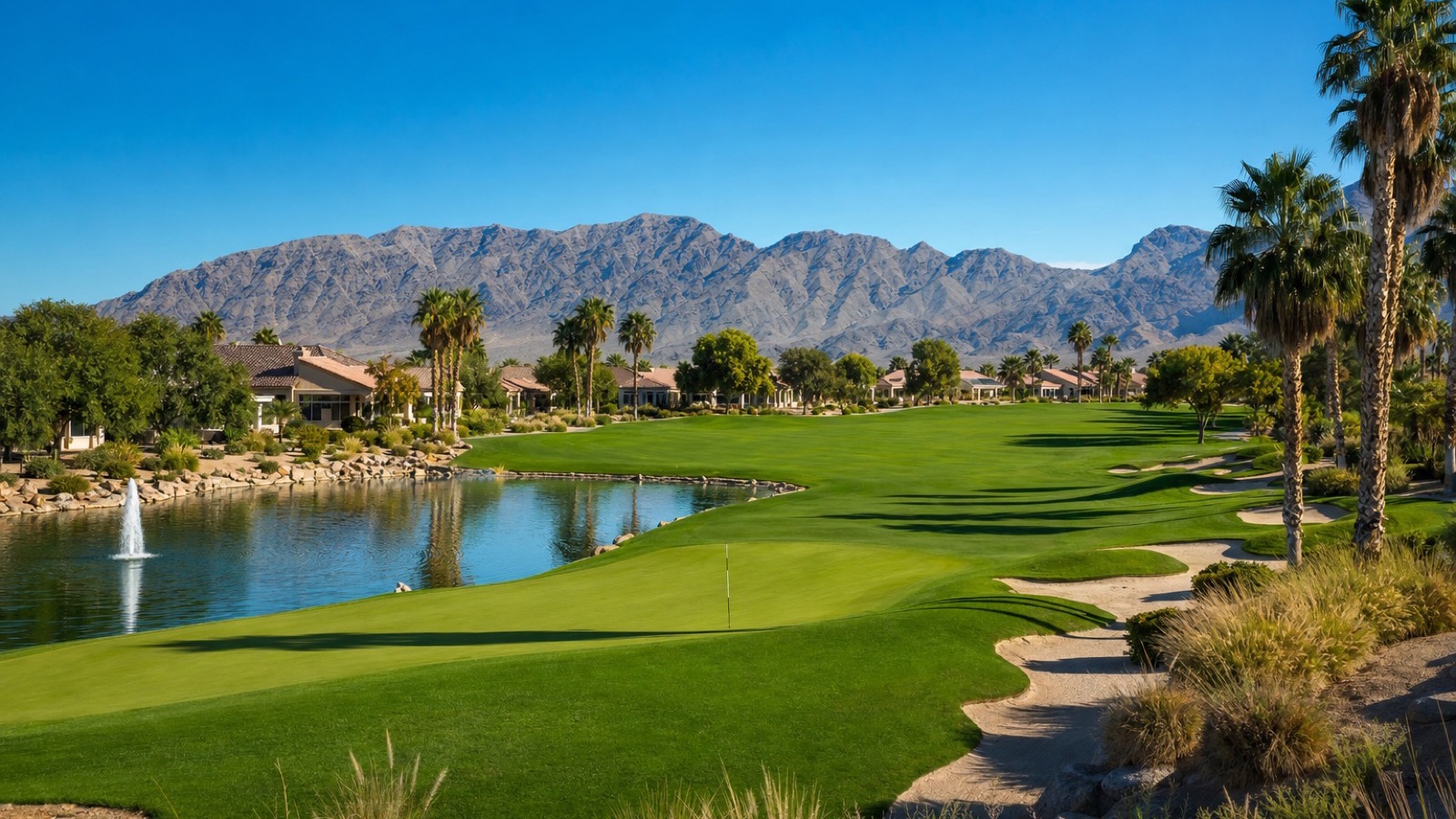Stallion Mountain east Las Vegas country club clubhouse and pool deck with palm trees