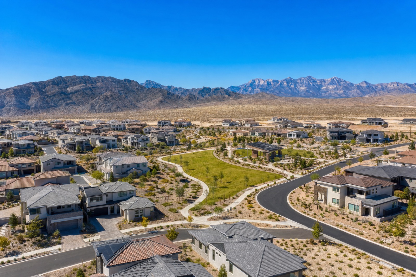 Northwest Las Vegas neighborhood at the base of Lone Mountain showing the wide-set residential streets and desert hillside
