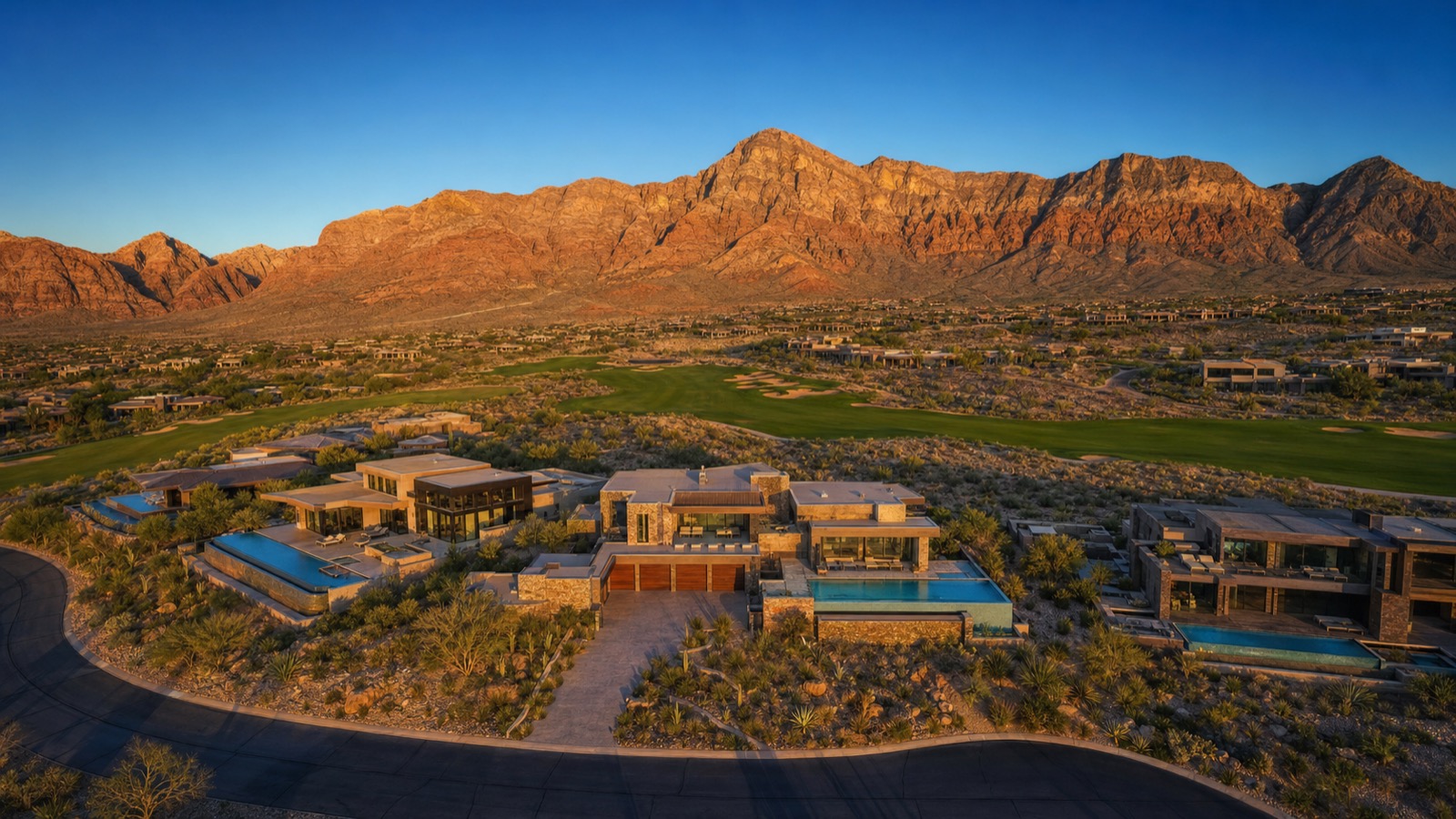 TPC Summerlin private golf course fairway adjacent to Tournament Hills community at golden hour