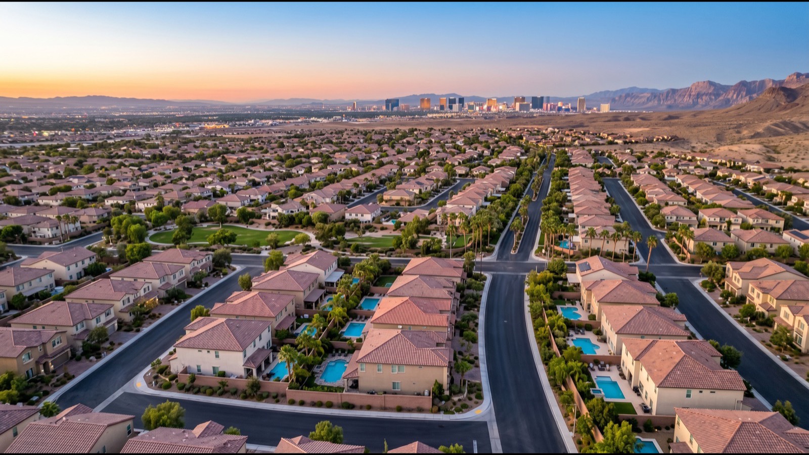 Aerial view of Turnberry Place four-tower residential complex on Paradise Road with the Wynn and Encore resorts visible to the west and the broader Las Vegas Strip skyline in the background
