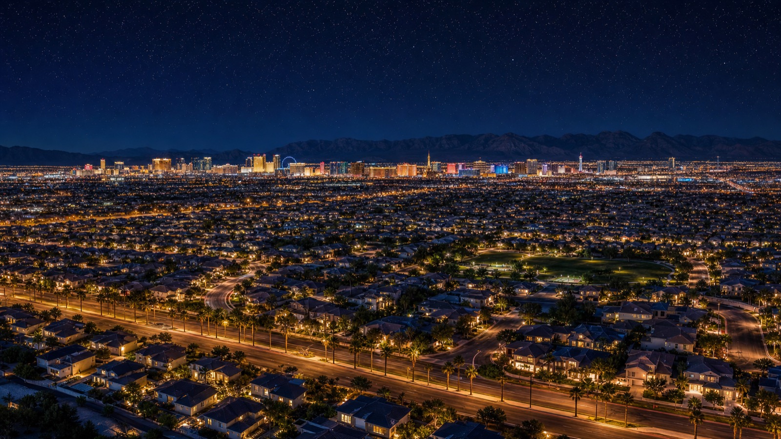 Las Vegas Strip glow at night with Veer Towers' twin tilted glass towers prominent against the CityCenter and broader Strip skyline