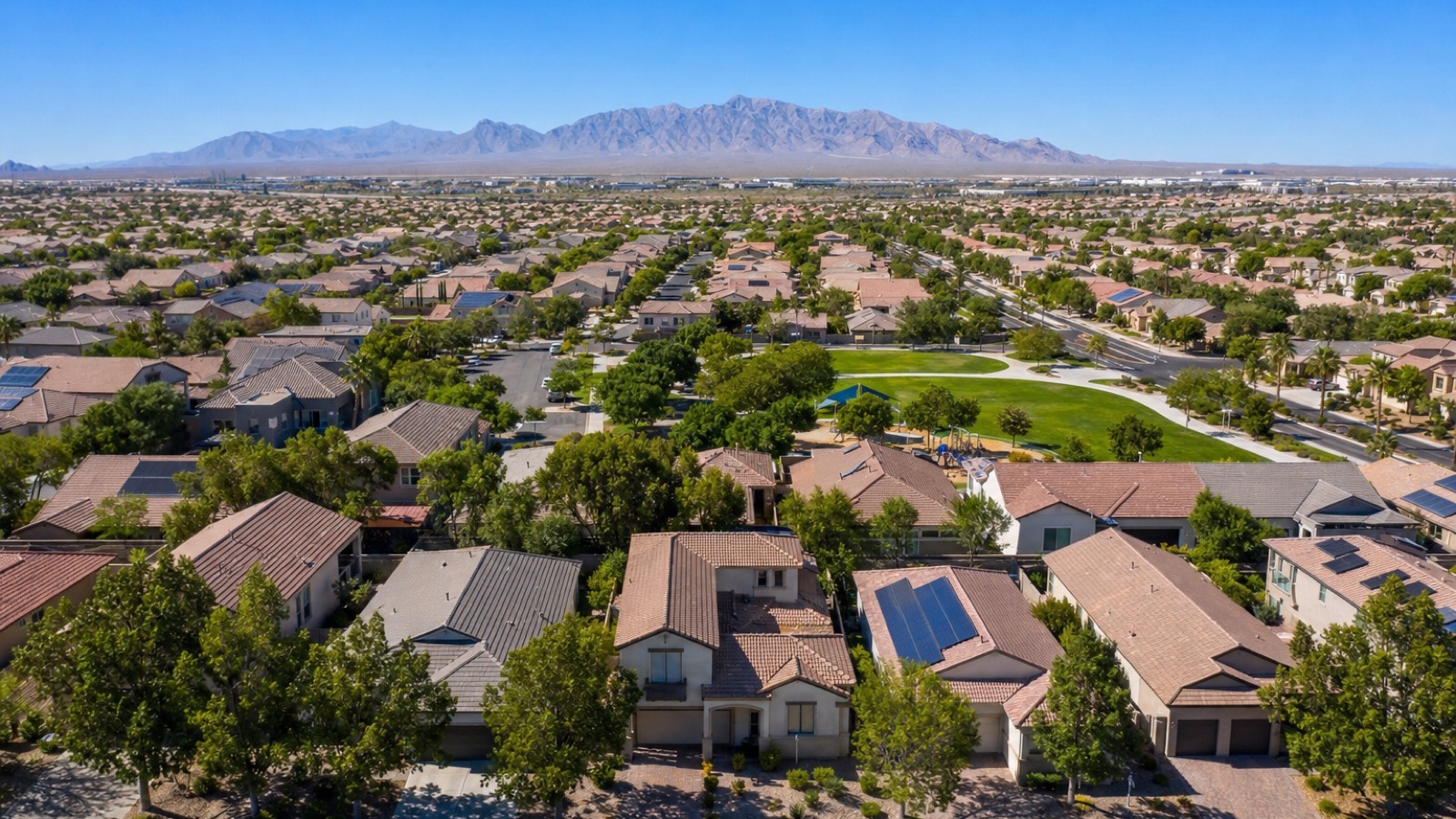 Whitney Ranch Henderson family residential streetscape with mature landscaping and Mediterranean homes