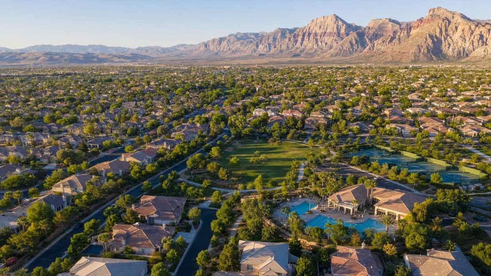 Aerial view of The Willows village in Summerlin North with single-family homes, parks, and Spring Mountains backdrop — Las Vegas, Nevada